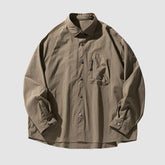 Camisas impermeables con bolsillo 3D